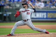 Minnesota Twins starting pitcher Martin Perez delivers to a Kansas City Royals batter during the first inning of a baseball game at Kauffman Stadium in Kansas City, Mo., Sunday, Sept. 29, 2019. (AP Photo/Orlin Wagner)