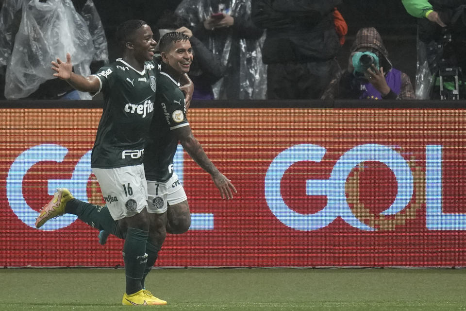 Palmeiras' Dudu, right, celebrates with teammate Endrick after scoring during a Brazilian soccer league match against Fortaleza in Sao Paulo, Brazil, Wednesday, Nov. 2, 2022. (AP Photo/Andre Penner)