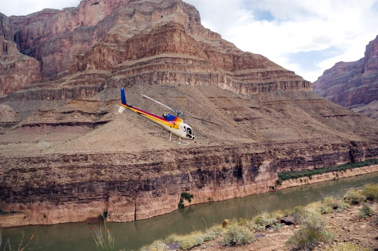 Chopper flying over the Grand Canyon (Getty Images/iStockphoto)