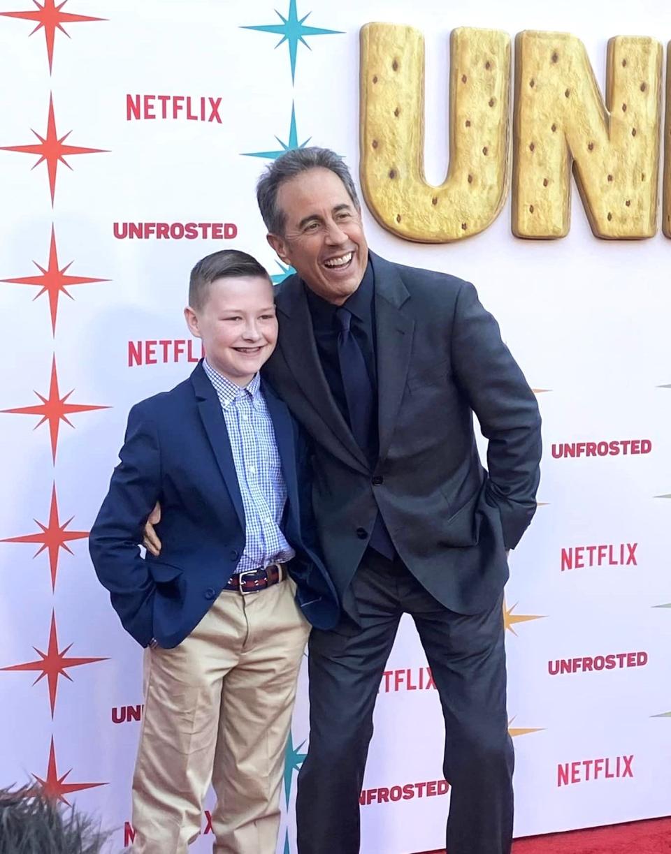 "Unfrosted" co-stars Jerry Seinfeld and Bailey Sheetz of Chester, Virginia strike poses on the red carpet at the movie premiere in Hollywood.