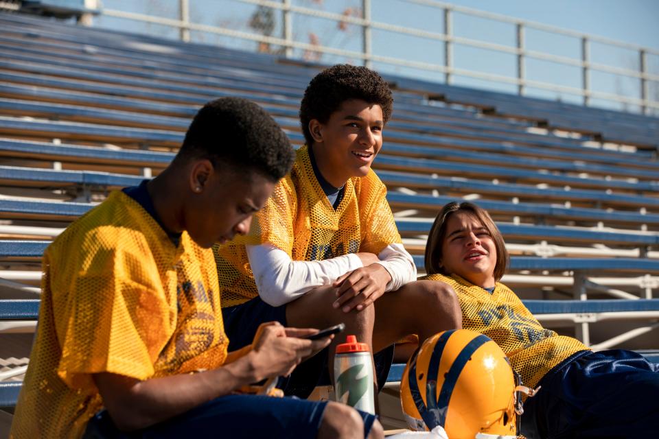 In "Colin in Black and White" Jaden Michael (center) plays a young Colin Kaepernick going through high school as a star athlete. He often confronts his biracial identity with friends Jake (Mace Coronel, right) and Eddie (Amarr Wooten, left).