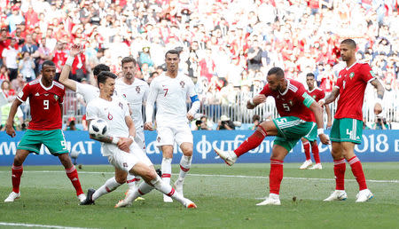 Soccer Football - World Cup - Group B - Portugal vs Morocco - Luzhniki Stadium, Moscow, Russia - June 20, 2018 Morocco's Medhi Benatia misses a chance to score REUTERS/Carl Recine