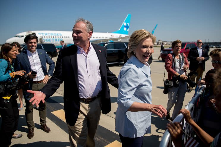 Democratic presidential candidate Hillary Clinton and Democratic vice presidential candidate Sen. Tim Kaine greet members of a crowd as Clinton arrives at Cleveland Hopkins International Airport in Cleveland, Ohio, Monday, Sept. 5, 2016, after traveling from Westchester County Airport in White Plains, N.Y. (Photo: Andrew Harnik/AP)