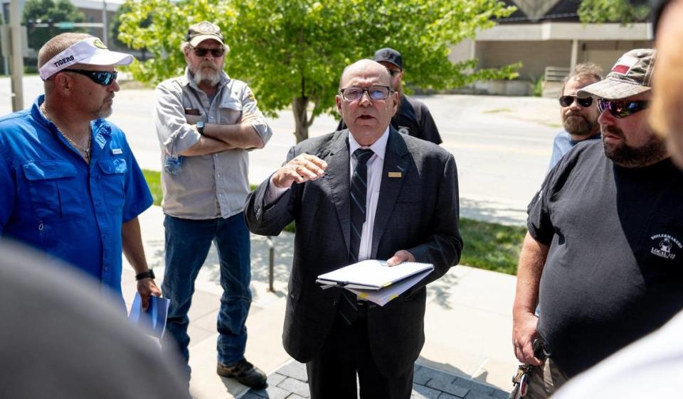 John Fultz, an International Brotherhood of Boilermakers International vice president, spoke with union members outside the federal courthouse in Kansas City, Kansas.