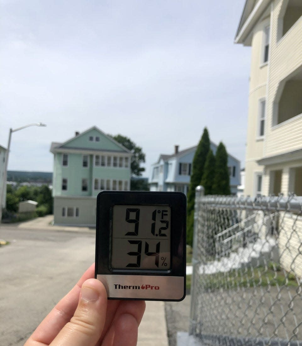 A temperature taken in Worcester's Vernon Hill neighborhood on a Wednesday afternoon showed 91.2 degrees, while the Weather Channel phone app showed 83 for the area.