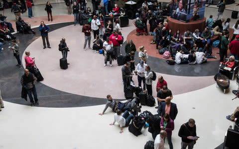 Long lines form at Hartsfield-Jackson International Airport  - Credit: Steve Schaefer /AP