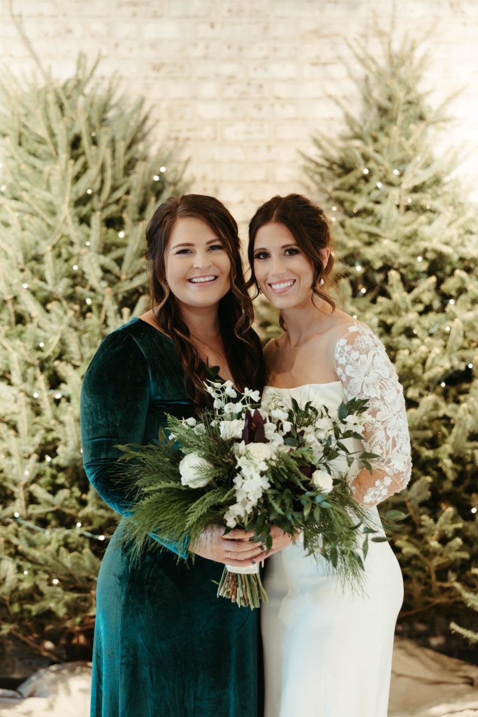 Bri Buzick, left, and Mallory Gritsch, on Mallory's Dec. 16, 2022, wedding day at Ankeny venue Toast.