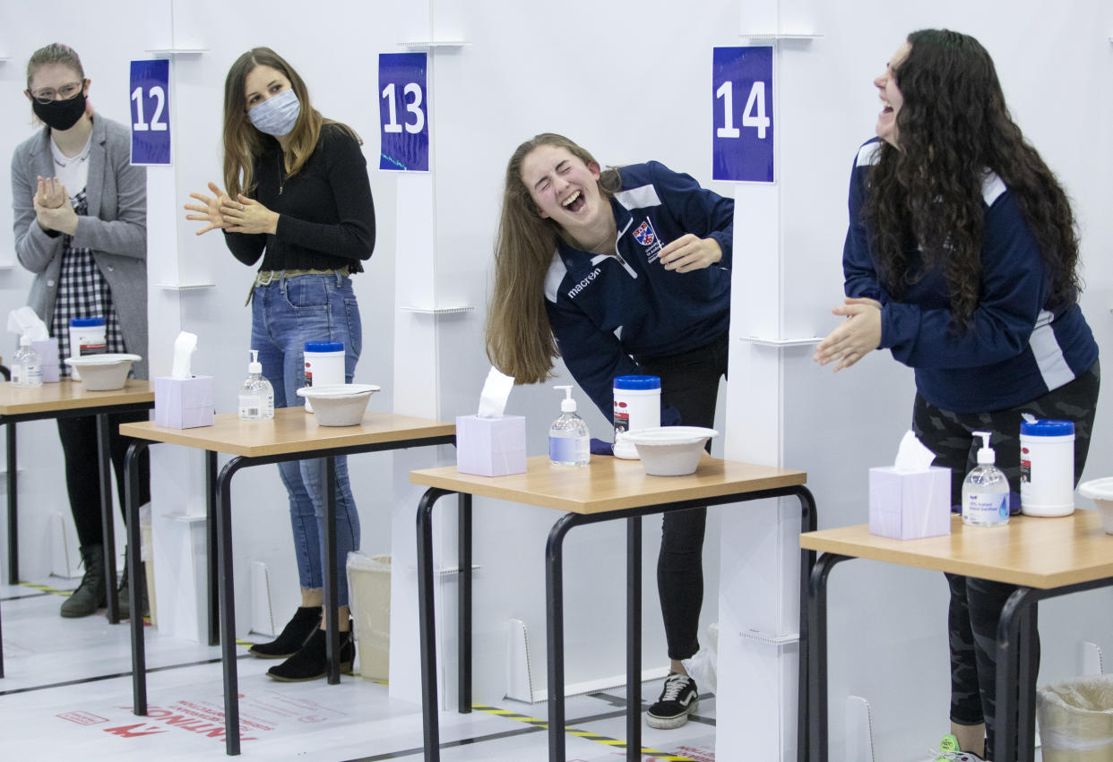 Students get a Covid-19 test at a mass testing centre set up at the sports centre at St Andrews University, ahead of the Christmas holiday. (Photo by Jane Barlow/PA Images via Getty Images)