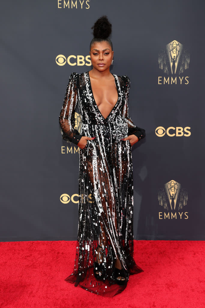 <p>Henson oozed glamour in a sequinned monochrome look with plunging neckline by Elie Saab. <em>(Image via Getty Images)</em></p> 