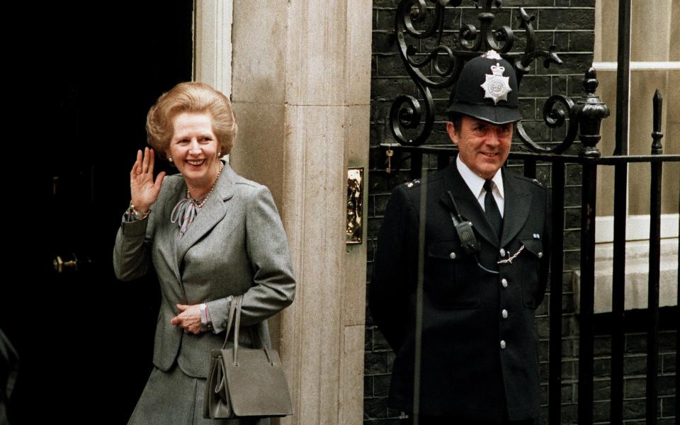 Prime Minister Margaret Thatcher with her Asprey handbag, in 1987 - John Redman