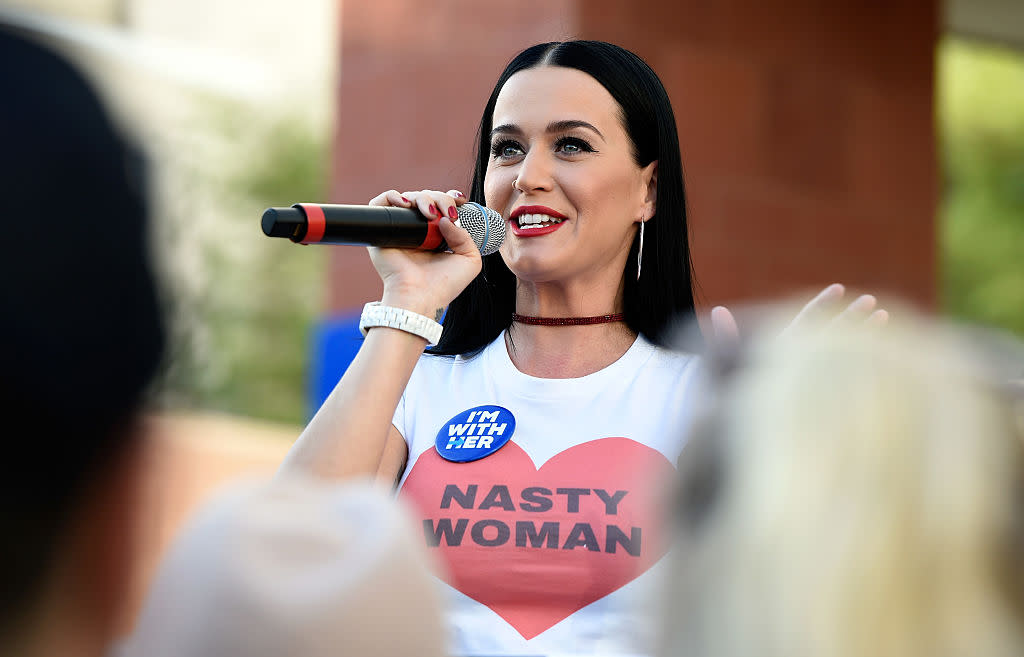 Katy Perry looks like a chic lady liberty as she casts her early voting ballot