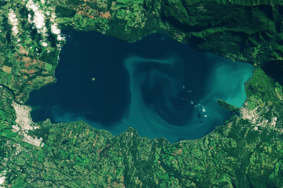 The Operational Land Imager (OLI) on the Landsat 8 satellite captured this image of an algal bloom on Lake Villarrica in Chile on May 2, 2023. Ground-based observations and analysis of additional satellite images suggest that cyanobacteria make up the light blue-green swirls in the natural-color image.