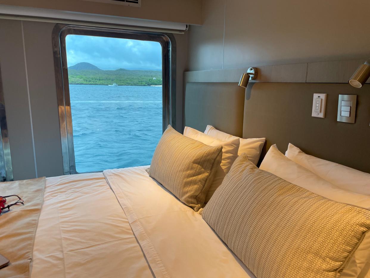 Evolve ship stateroom featuring large windows.