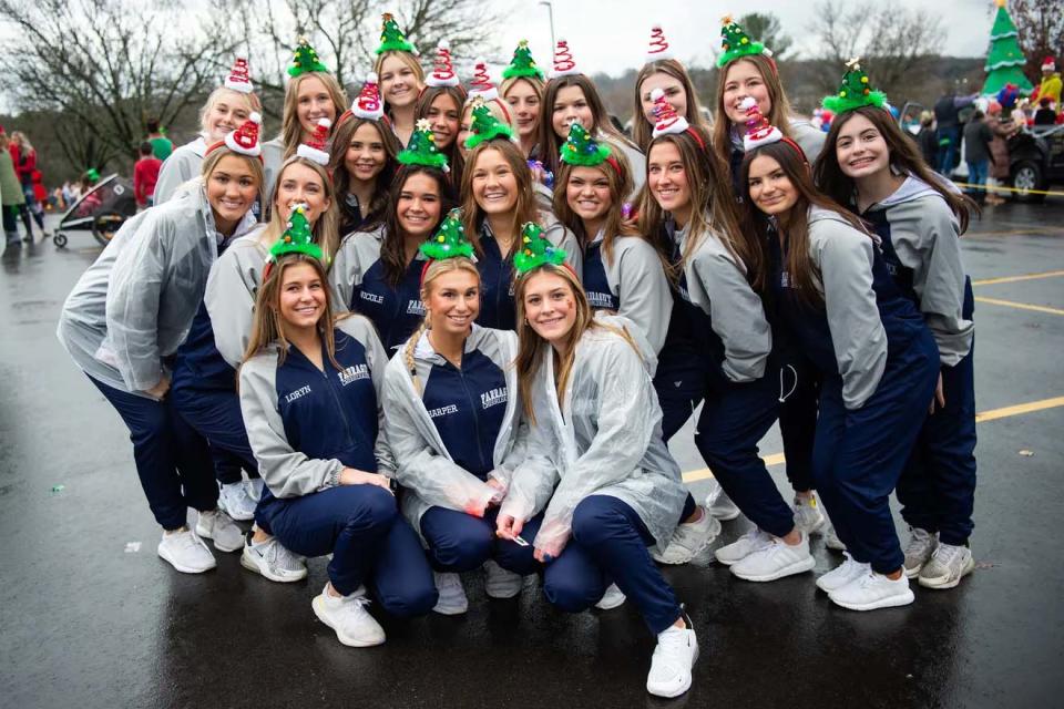 The Farragut High School cheer squad joins the Farragut Christmas parade.