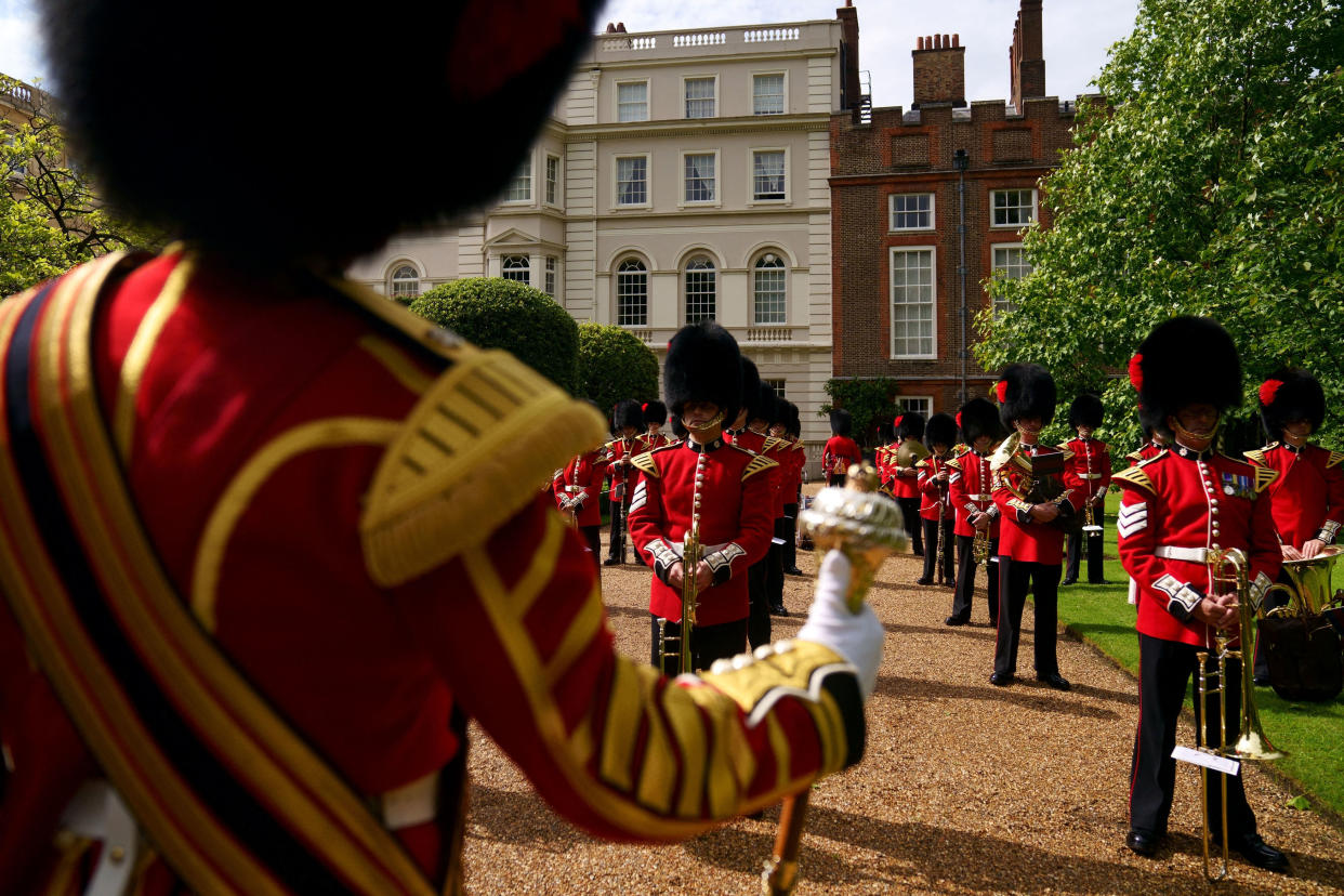 The Band of the Coldstream Guards plays 'Three Lions' and 'Sweet Caroline' in the gardens of Clarence House in London on July 6, 2021, ahead of England's UEFA EURO 2020 semi-final football match against Denmark on July 7. (Photo by Victoria Jones / POOL / AFP) (Photo by VICTORIA JONES/POOL/AFP via Getty Images)