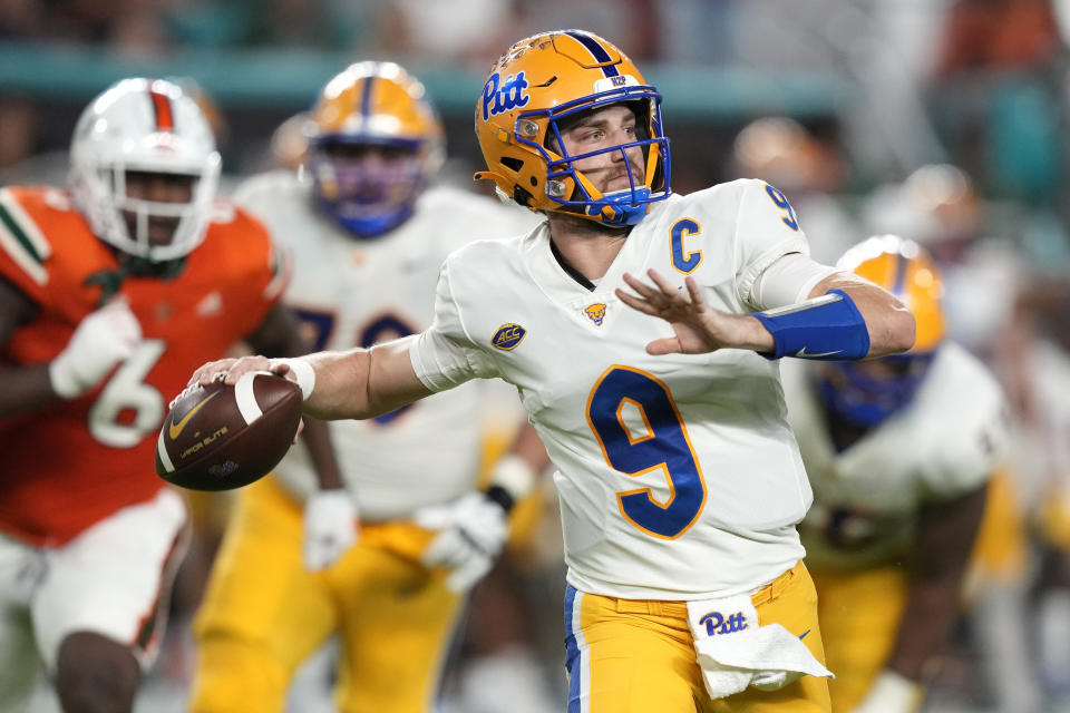 Pittsburgh quarterback Kedon Slovis (9) prepares to pass during the first half of an NCAA college football game against Miami, Saturday, Nov. 26, 2022, in Miami Gardens, Fla. (AP Photo/Lynne Sladky)