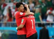 Soccer Football - World Cup - Group F - South Korea vs Mexico - Rostov Arena, Rostov-on-Don, Russia - June 23, 2018 South Korea's Ju Se-jong and Hwang Hee-chan look dejected after the match REUTERS/Marko Djurica