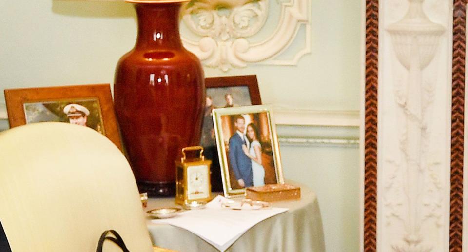 A close up of the never-been-seen photo of Prince Harry and Meghan Markle at Buckingham Palace. (Photo: Getty Images)