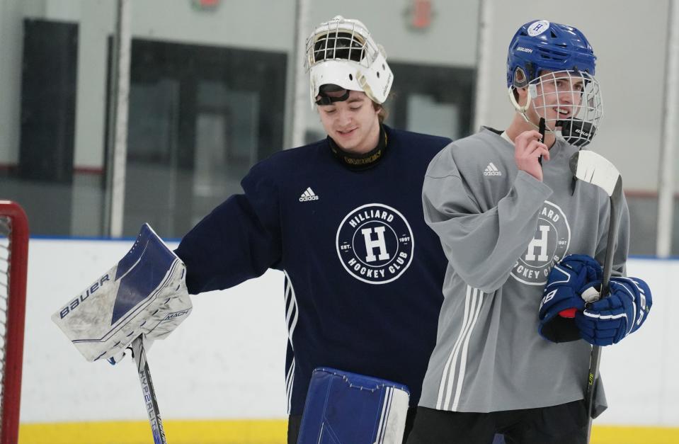 Hilliard goalie Michael Slivon and Drew Forchione participate in practice Thursday at Chiller Dublin.