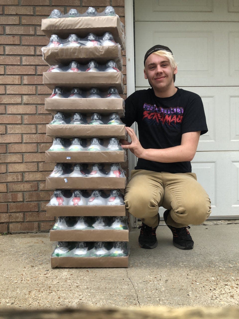 Clayton Williams poses with Star Wars: Galaxy's Edge's famous thermal detonator soda bottles, found at a supermarket in Alabama.