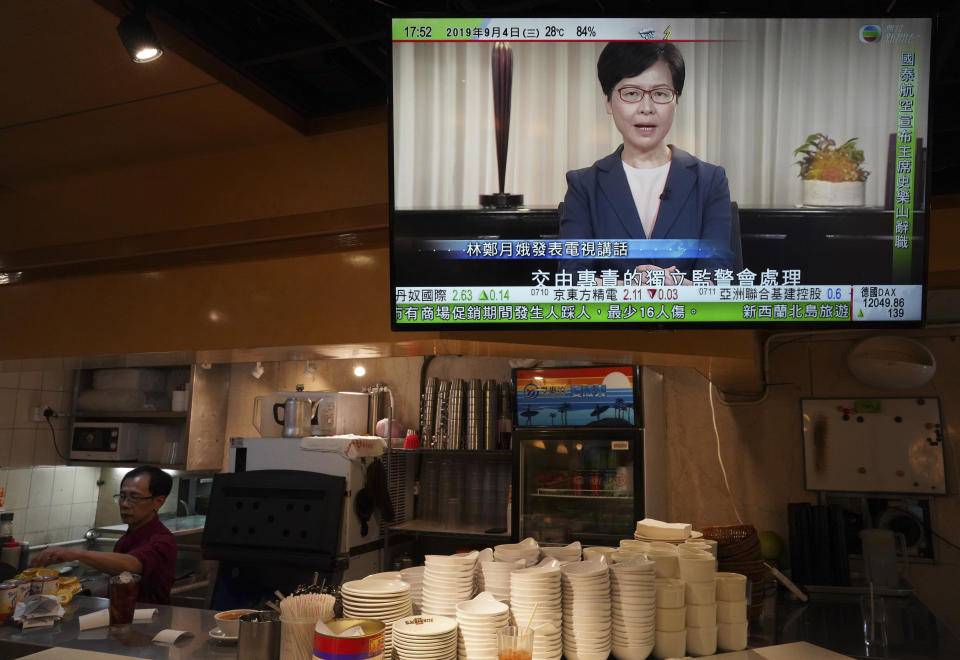 Hong Kong Chief Executive Carrie Lam, seen in a telecast, makes an announcement in Hong Kong, on Wednesday, Sept. 4, 2019. Chief Executive Lam has announced the government will formally withdraw an extradition bill that has sparked months of demonstrations in the city, bowing to one of the protesters' demands. The bill would have allowed Hong Kong residents to be sent to mainland China for trials. It sparked massive protests that have become increasingly violent and caused the airport to shut down earlier this month.(AP Photo/Vincent Yu)