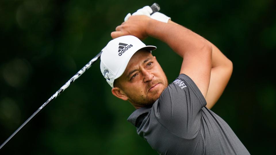 Xander Schauffele watches his shot on the 12th hole during the first round of the Travelers Championship golf tournament at TPC River Highlands, Thursday, June 23, 2022, in Cromwell, Conn. (AP Photo/Seth Wenig)