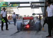 Sauber Formula One driver Esteban Gutierrez of Mexico drives in the pit lane during the third practice session of the Abu Dhabi F1 Grand Prix at the Yas Marina circuit on Yas Island, November 2, 2013. REUTERS/Ahmed Jadallah (UNITED ARAB EMIRATES - Tags: SPORT MOTORSPORT F1)