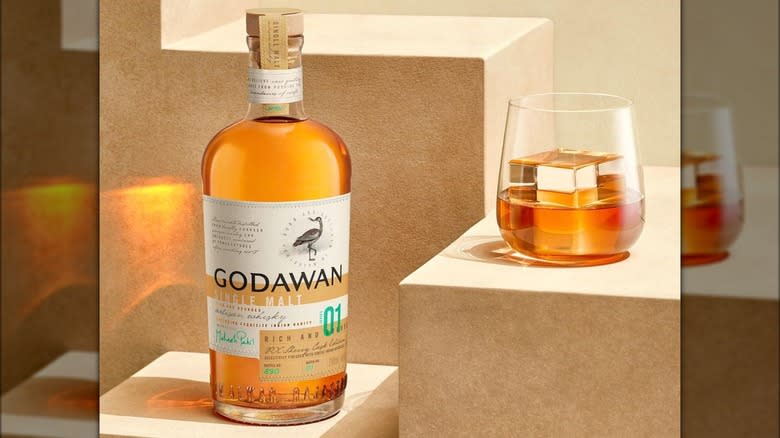 bottle and glass godawan whisky