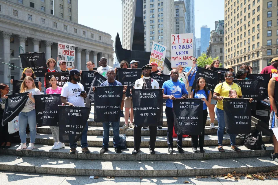 People hold banners with the names of people who have died in Rikers Island jail during a rally on July 11, 2023, in New York City. <a href="https://www.gettyimages.com/detail/news-photo/people-hold-banners-with-the-names-of-people-who-have-died-news-photo/1534248945?adppopup=true" rel="nofollow noopener" target="_blank" data-ylk="slk:Michael M. Santiago/Getty Images;elm:context_link;itc:0" class="link rapid-noclick-resp">Michael M. Santiago/Getty Images</a>