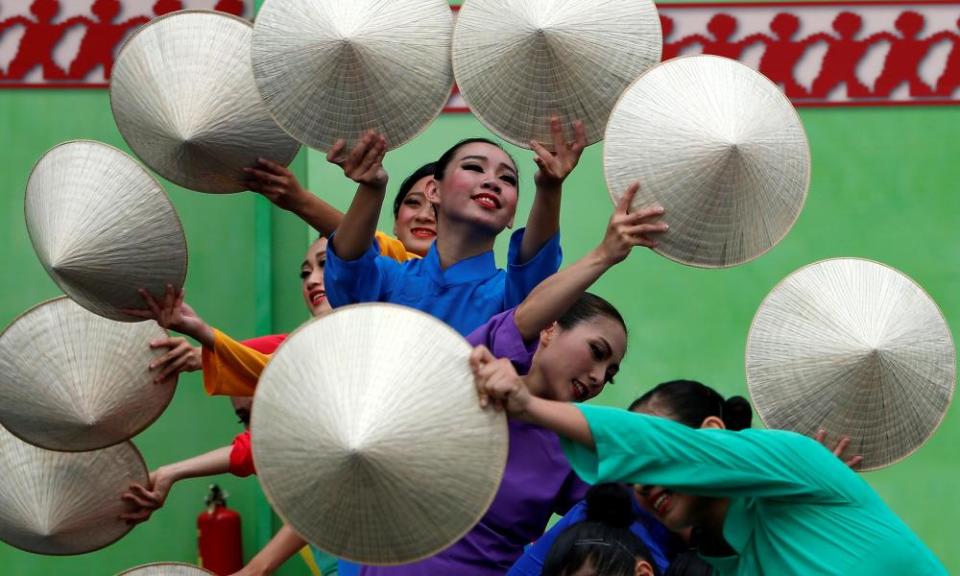 Performers dance during a parade to reflect Taiwan’s history as part of an inauguration ceremony of Taiwan’s President Tsai Ing-wen in Taipei, 20 May 2016.