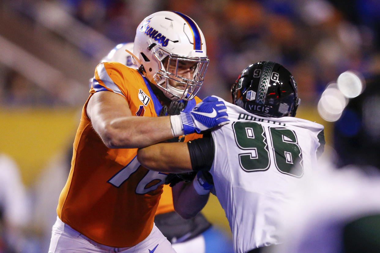 There's only so much teams can glean from phone or video chats with prospects like Boise State offensive lineman Ezra Cleveland. (AP Photo/Steve Conner)