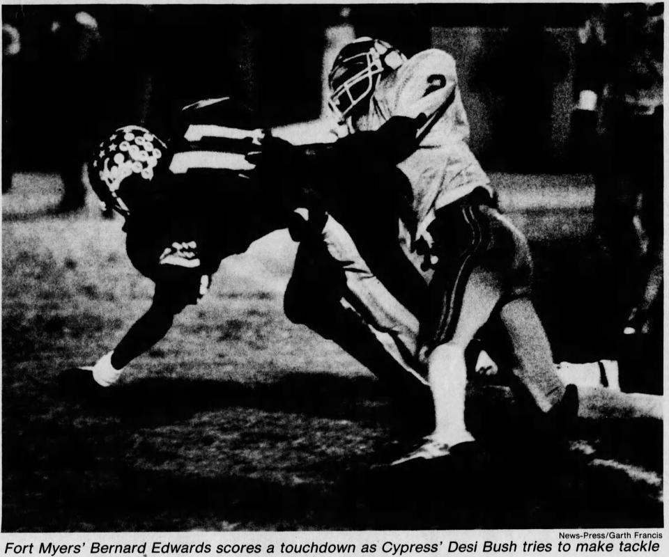 Fort Myers quarterback Mike McQuagge threw three touchdown passes, all to Bernard Edwards (shown) to power the Green Wave to a 27-0 win over Cypress Lake at Edison Stadium in 1985. The victory was the 400th all-time win for Fort Myers.
