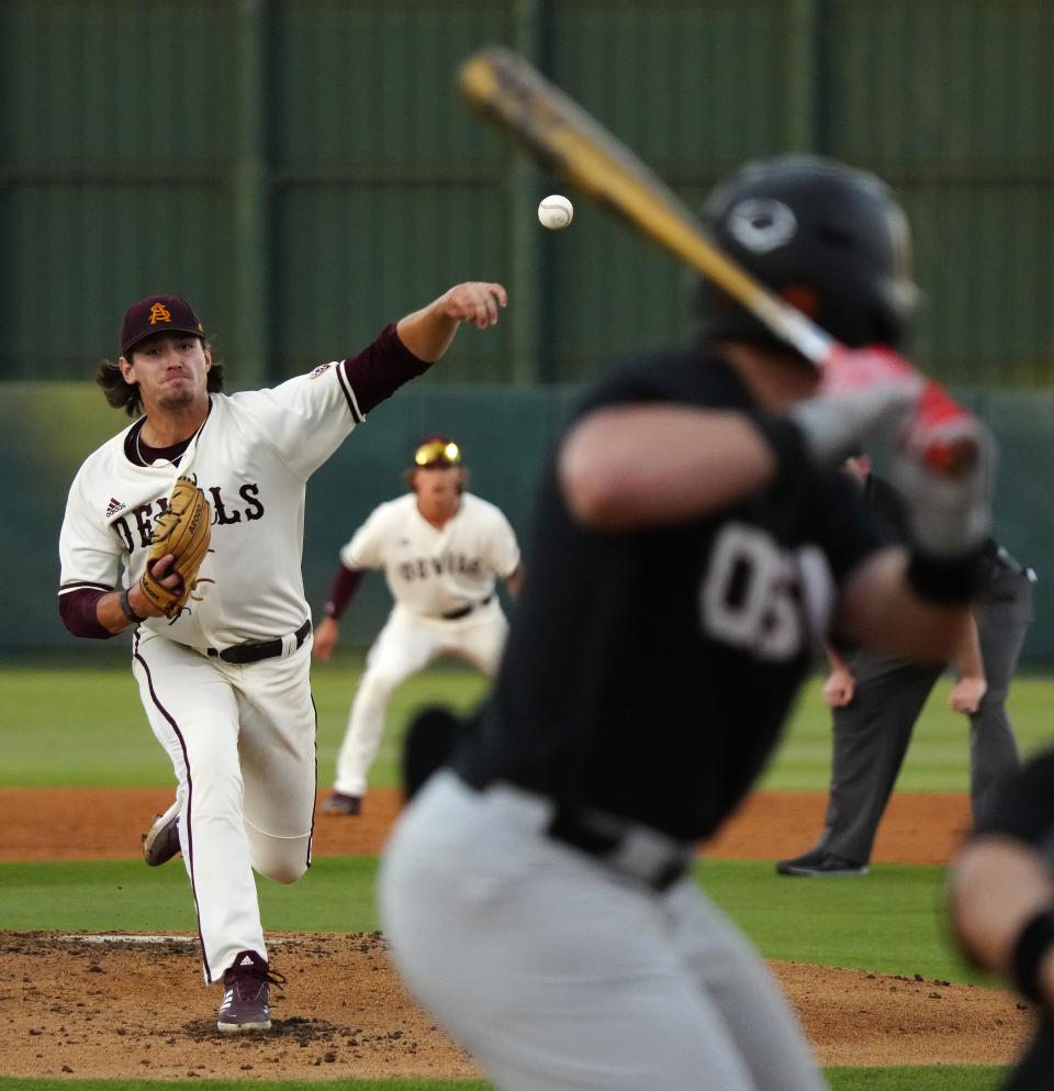 ASU pitcher Ross Dunn (46) pitches against Oregon State at Phoenix Municipal Stadium on April 21, 2023.