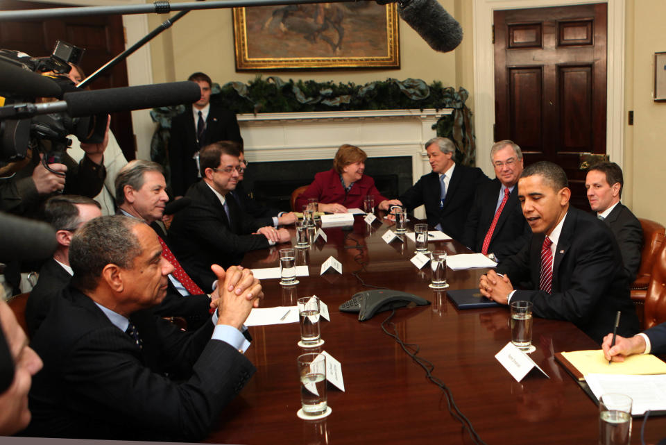 WASHINGTON - DECEMBER 14:  President Barack Obama (2R), Treasury Secretary Timothy Geithner (R), and Chair of the Council of Economic Advisors Christina Romer (5R) meet with CEO of PNC Jim Rohr (3R), CEO of JPMorgan Chase Jamie Dimon (4R), and other members of the financial services industry at the White House on December 14, 2009 in Washington, DC. President Obama met with the group to discuss economic recovery and financial reform, as well as lending practices for small businesses and homeowners.  (Photo by Dennis Brack-Pool/Getty Images)