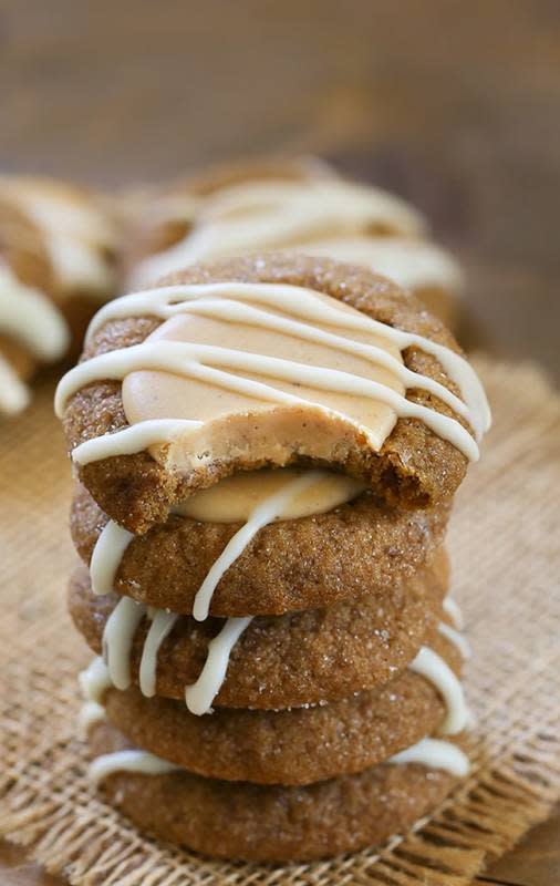 <p>If you’re looking for the perfect Christmas holiday cookie to make this season than you’ll love these Gingerbread Thumbprint Cookies. Classic soft gingerbread cookies with a white chocolate center and chocolate drizzle.</p><p><strong>Get the recipe: <a href="https://www.swankyrecipes.com/gingerbread-thumbprint-cookies.html" rel="nofollow noopener" target="_blank" data-ylk="slk:Gingerbread Thumbprint Cookies;elm:context_link;itc:0;sec:content-canvas" class="link ">Gingerbread Thumbprint Cookies</a></strong></p>