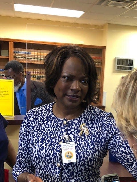 Orlando Democrat Val Demings meets with a supporter after filing U.S. Senate candidacy papers  in Tallahassee.
