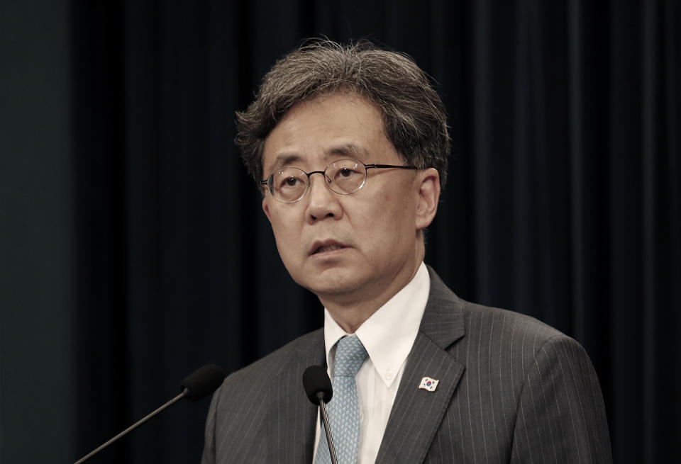Kim Hyun-chong, deputy director of South Korea's presidential National Security Office, briefs on the South Korean government's stance on Japan's recent restrictions on its exports to South Korea at the presidential Blue House in Seoul, South Korea, Friday, July 19, 2019. Japan's Foreign Minister Taro Kono on Friday summoned South Korea's ambassador and accused Seoul of violating international law by refusing to join in an arbitration panel to settle a dispute over World War II forced labor. (AP Photo/Ahn Young-joon)