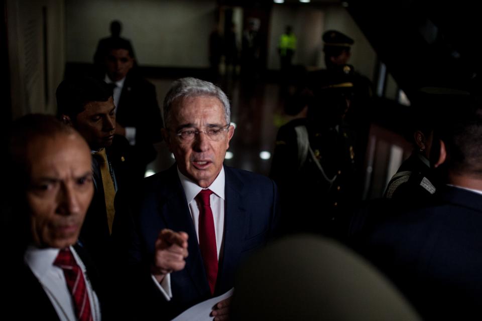 BOGOTA - COLOMBIA, OCTOBER 08: Former Colombian president, Alvaro Uribe speaks as he arrives to the Supreme Court to face a historical judicial investigation over alleged witness tampering in Bogota, Colombia on October 08, 2019. In a landmark case that has deeply polarized Colombia, former president Álvaro Uribe will testify before the Supreme Court on October 8, marking the first time that a former president will appear before the court in an investigation that could eventually result in him facing criminal charges. The investigation has serious implications for the independence of Colombias justice institutions, as well as the ongoing efforts to uncover the full truth about the powerful political networks that backed paramilitary death squads during Colombias decades-long conflict. (Photo by Juancho Torres/Anadolu Agency via Getty Images)