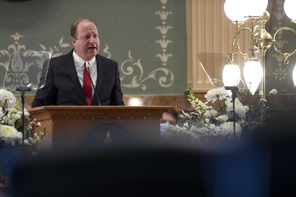 Colorado Gov. Jared Polis delivers his 2022 State of the State address at the Capitol in January.