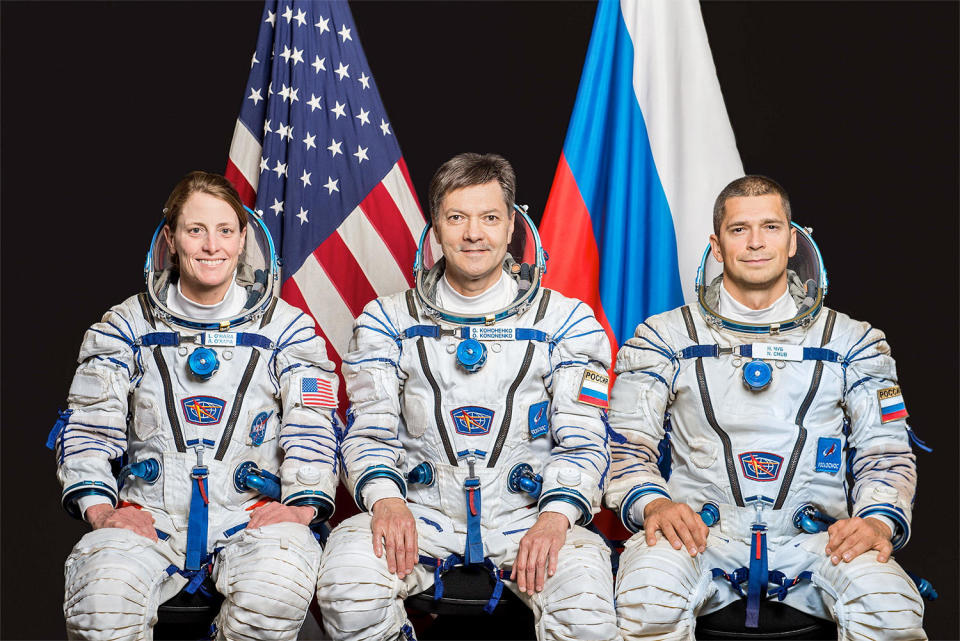 Astronaut Loral O'Hara (left) launched to the space station with Soyuz commander Oleg Kononenko (center) and cosmonaut Nikolai Chub (right). O'Hara will return to Earth with a different Soyuz crew in April while Kononenko and Chub remain in space for a full year, returning in September aboard a fresh Soyuz scheduled for launch later this month along with NASA astronaut Tracy Dyson. / Credit: NASA/Roscosmos