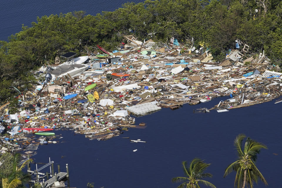 Debris is piled up at the end of a cove following heavy winds and storm surge caused by Hurricane Ian, Sept. 29, 2022, in Barefoot Beach, Fla. Florida has seen an increase in cases of flesh-eating bacteria this year driven largely by a surge in the county hit hardest by Hurricane Ian. The state Department of Health reports that as of Friday there have been 65 cases of vibrio vulnificus infections and 11 deaths in Florida this year. That compares to 34 cases and 10 deaths reported during all of 2021. (AP Photo/Marta Lavandier)