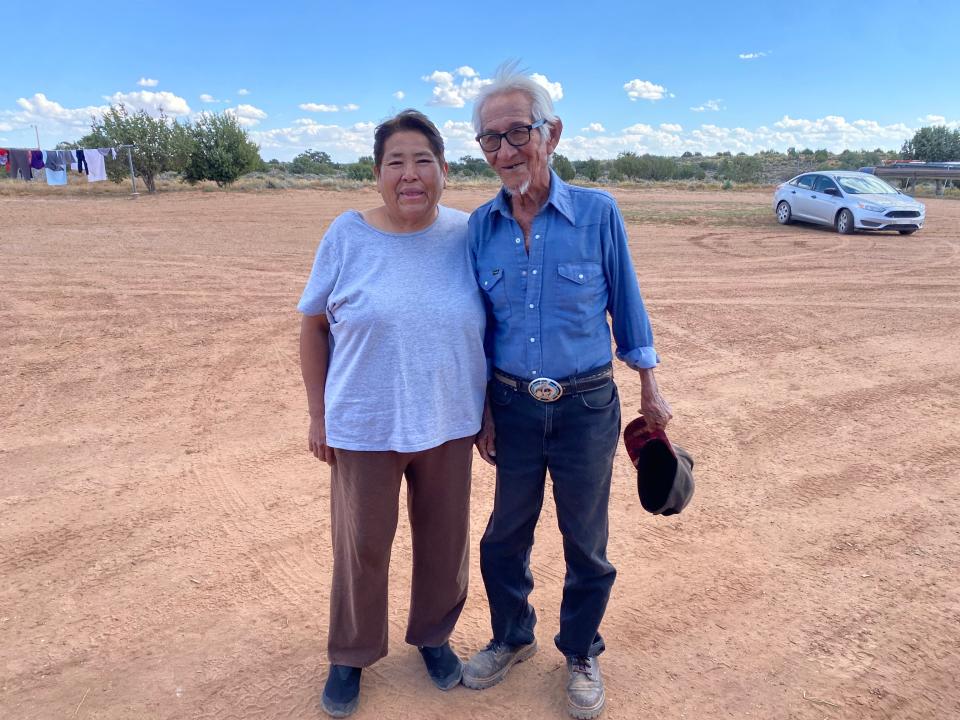 Lavonnia Begay with a visiting relative at her home in Tonalea, Ariz. a community that continues to be affected by the Bennett Freeze that was lifted in 2009.