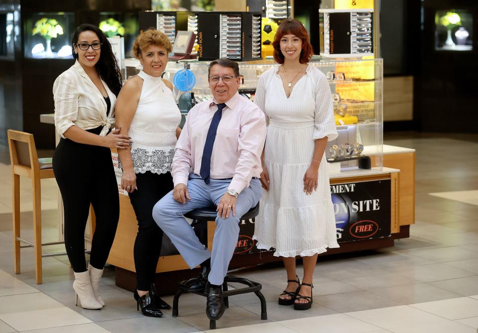 Gisel Sandivar, Yunis Sandivar, Marcelo Sandivar and Jasmine Sandivar pose for a portrait in front of their family business, Fashion Watch & Clock, in Fashion Place Mall in Murray on Thursday, Aug. 24, 2023. | Kristin Murphy, Deseret News