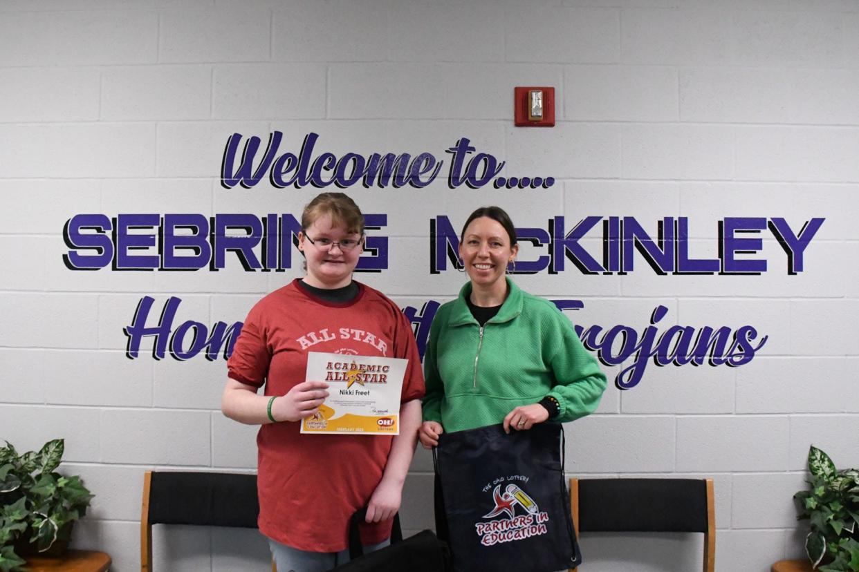 Sebring McKinley High School freshman Nikki Freet, left, received the Academic All Star Award from Ohio Lottery Partners in Education. With Freet is teacher Keely Kandel, who nominated Freet for the award.