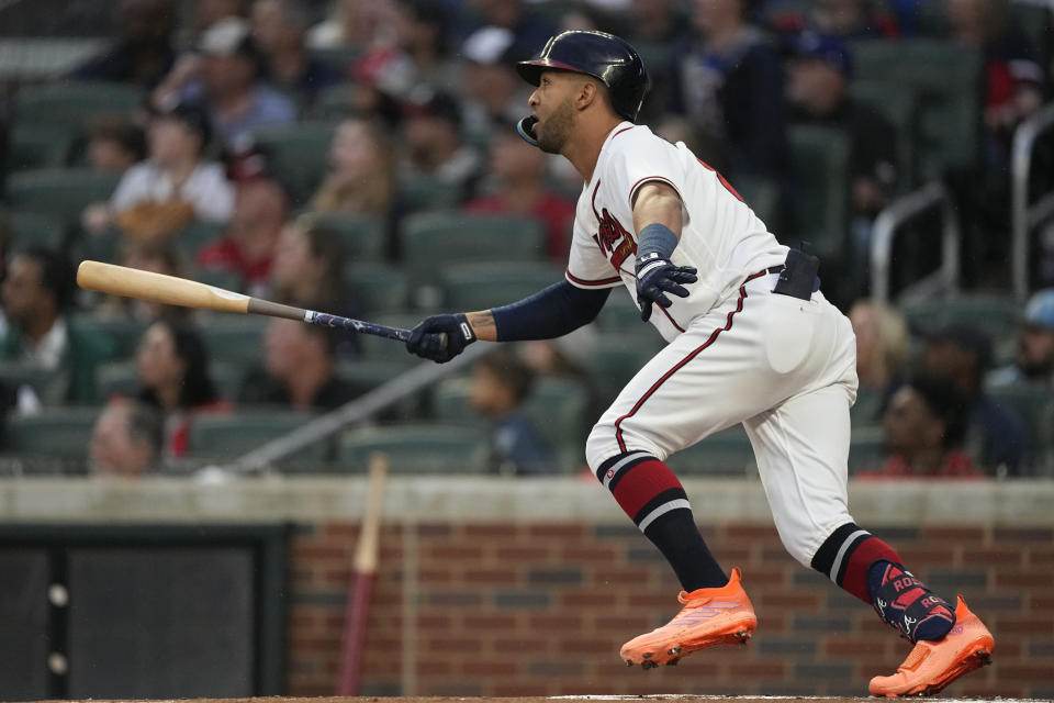 Atlanta Braves left fielder Eddie Rosario watch his three-run home run in the first inning of a baseball game against the Los Angeles Dodgers, Monday, May 22, 2023, in Atlanta. (AP Photo/John Bazemore)
