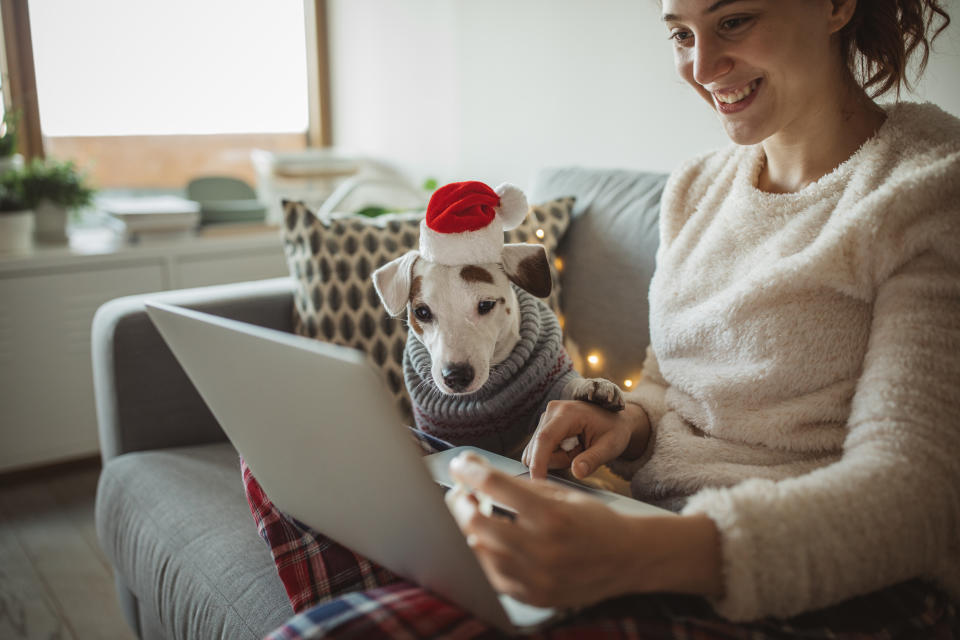 Paying strictly cash for holiday expenses won't be the most feasible strategy in 2020 when shoppers are poised to rely more than ever on online transactions. (Photo: Getty)