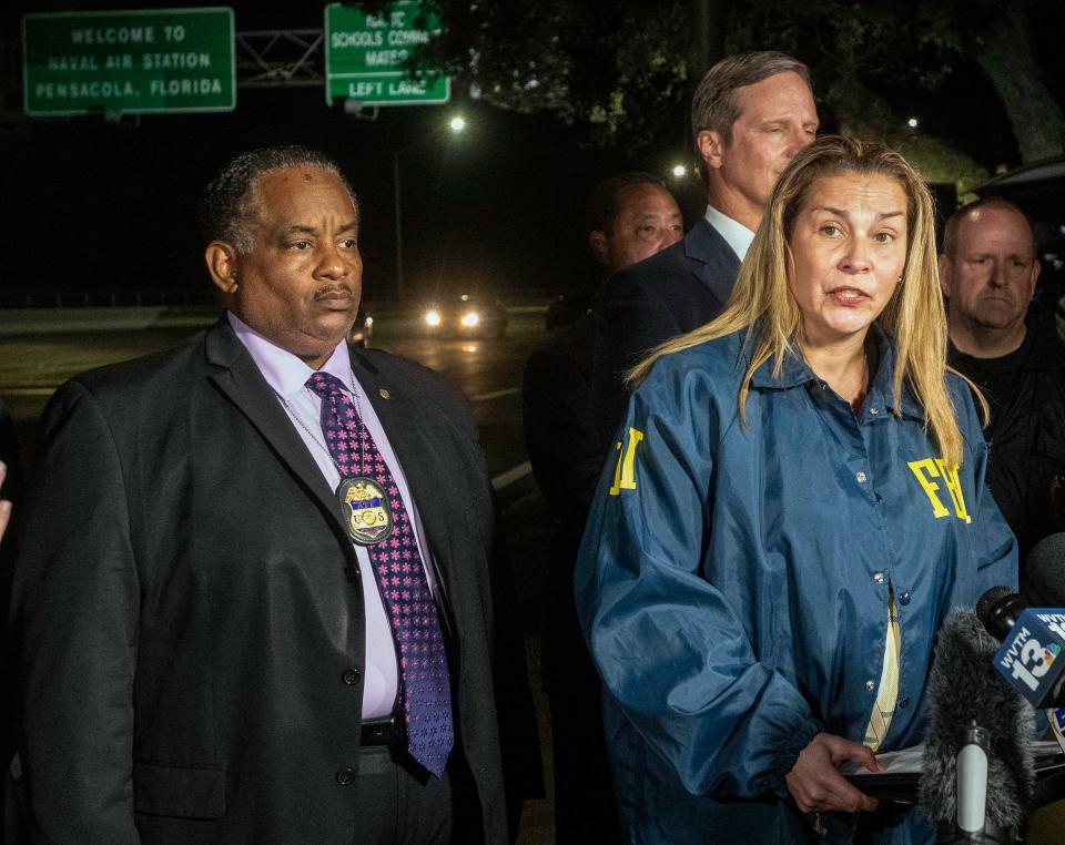 FBI Special Agent Rachel Rojas makes a brief announcement during a press conference outside Naval Air Station Pensacola on Friday. Dec. 6, 2019.