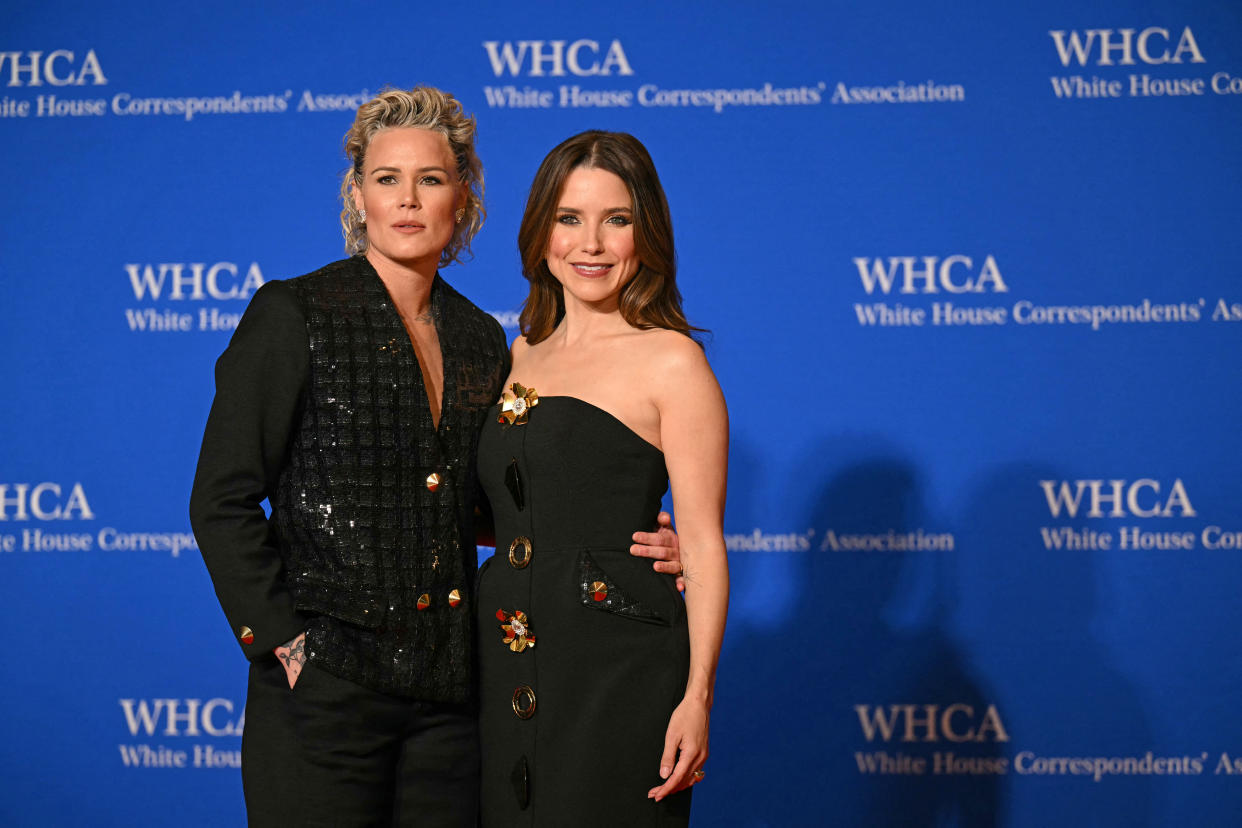 US former football player Ashlyn Harris (L) and US actress Sophia Bush arrive for the White House Correspondents' Association (WHCA) dinner at the Washington Hilton, in Washington, DC, on April 27, 2024. (Photo by Drew ANGERER / AFP) (Photo by DREW ANGERER/AFP via Getty Images)