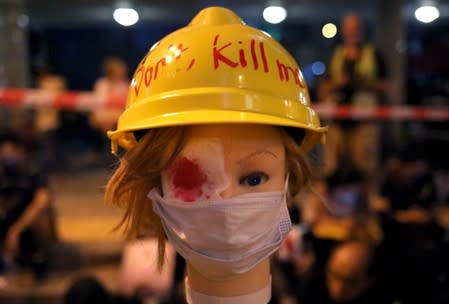 Protesters attend a "Stand with Hong Kong, Power to the People Rally" at the Chater Garden, in Hong Kong