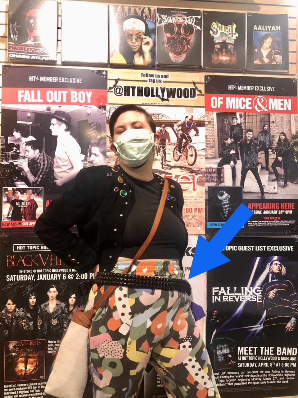 Author's friend posing with a studded belt